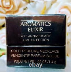 Estee Lauder Aromatics elixir 40th Anniversary Solid Parfume necklace. 04oz1.4G