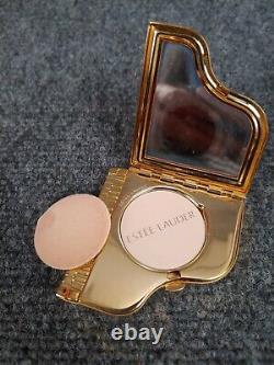 Beau compact piano Estee Lauder