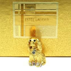 Prototype de compact de parfum solide Estee Lauder Spaniel Gold Eyes avec étiquette vierge en or