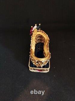 Vintage Estee Lauder Beautiful Rollicking Roller Coaster Perfume Compact translates to 'Vintage Estee Lauder Beautiful Compact de parfum Rollicking Roller Coaster' in French.